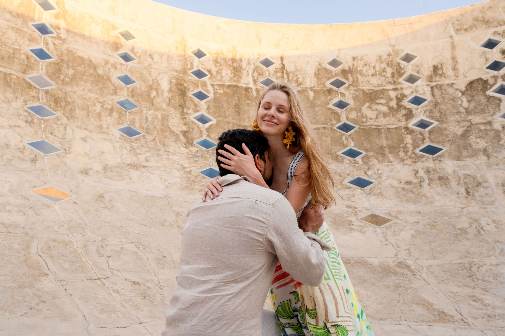 Zoe and Vik embracing
